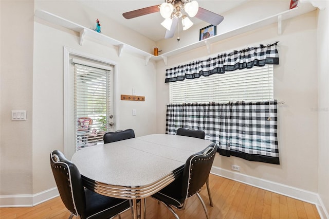 15604 Durango Cir, Brooksville, FL 34604 - dining space with ceiling fan and wood-type flooring