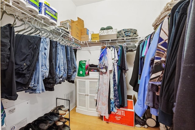 15604 Durango Cir, Brooksville, FL 34604 - walk in closet featuring wood finished floors