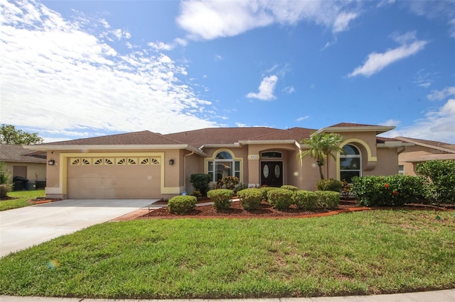 8311 Coral Creek Loop, Hudson, FL 34667 - view of front facade with stucco siding, a garage, concrete driveway, and a front lawn