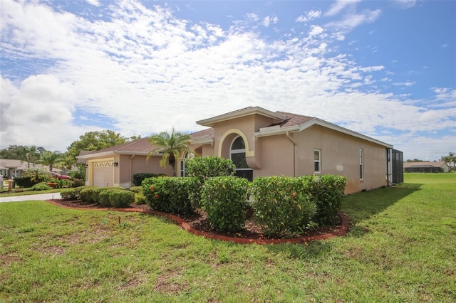 8311 Coral Creek Loop, Hudson, FL 34667 - view of front of property with stucco siding, a garage, and a front lawn