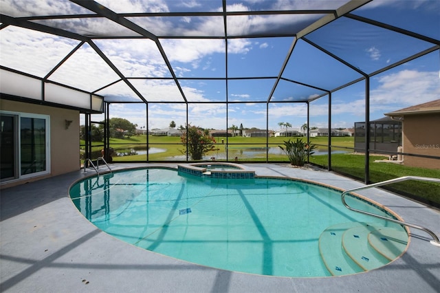 8311 Coral Creek Loop, Hudson, FL 34667 - view of swimming pool with a water view, a patio area, a pool with connected hot tub, glass enclosure, and a lawn