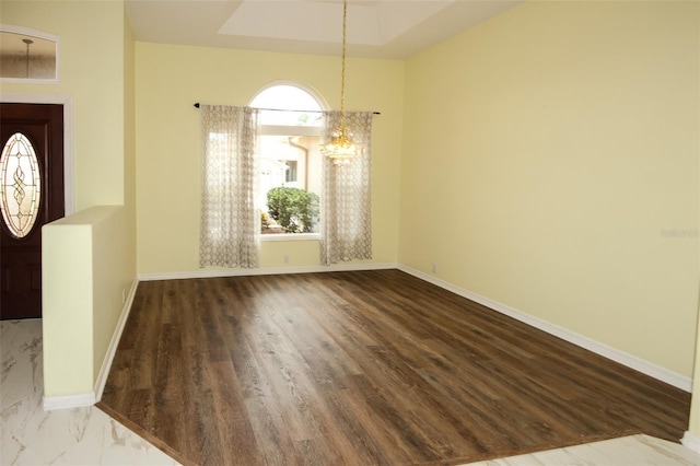 8311 Coral Creek Loop, Hudson, FL 34667 - entrance foyer with a chandelier and wood finished floors