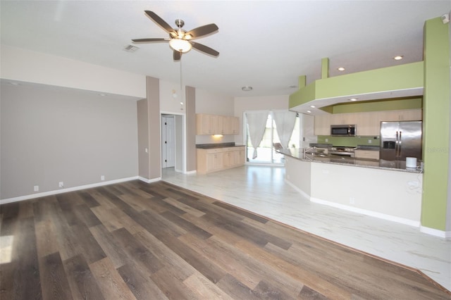 8311 Coral Creek Loop, Hudson, FL 34667 - kitchen with stainless steel appliances, light brown cabinets, ceiling fan, dark countertops, and recessed lighting