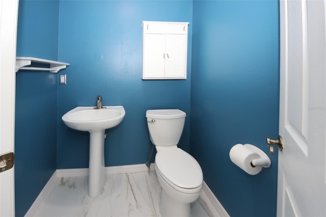 8311 Coral Creek Loop, Hudson, FL 34667 - bathroom featuring toilet and marble finish floors
