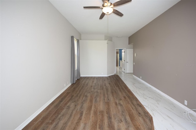 8311 Coral Creek Loop, Hudson, FL 34667 - empty room with a ceiling fan and wood finished floors