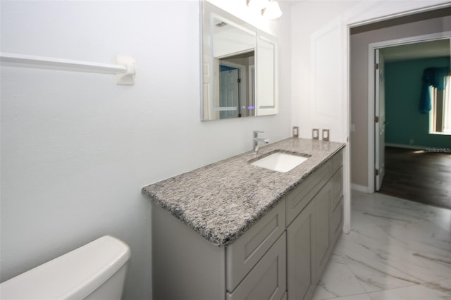 8311 Coral Creek Loop, Hudson, FL 34667 - bathroom featuring marble look tile flooring and vanity