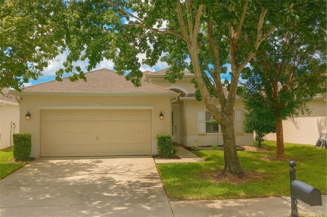 14647 Potterton Cir, Hudson, FL 34667 - view of front facade featuring stucco siding, concrete driveway, a garage, and a front yard