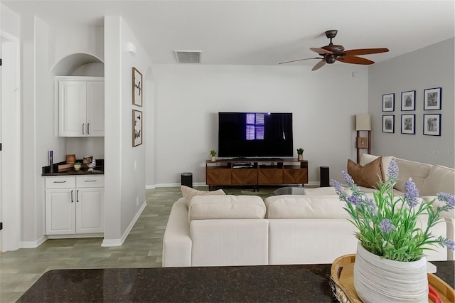 14647 Potterton Cir, Hudson, FL 34667 - living room featuring a ceiling fan and wood finished floors