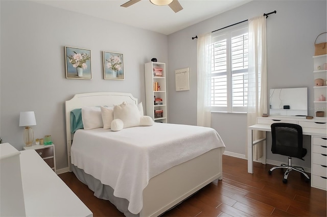 14647 Potterton Cir, Hudson, FL 34667 - bedroom featuring dark wood finished floors, an office area, and a ceiling fan