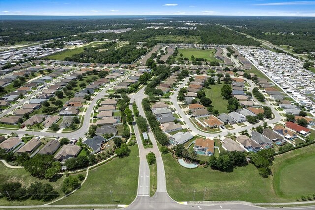 14647 Potterton Cir, Hudson, FL 34667 - aerial overview of property's location with nearby suburban area