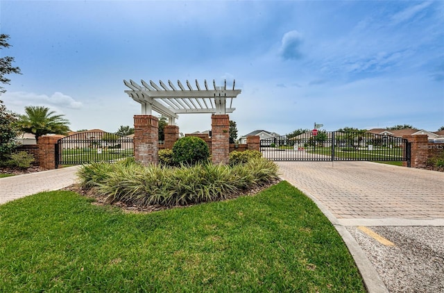 14647 Potterton Cir, Hudson, FL 34667 - community sign featuring a gate