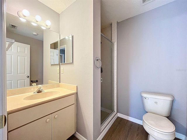 12214 Partridge Hill Row, Hudson, FL 34667 - full bath with wood finished floors, vanity, and a shower stall