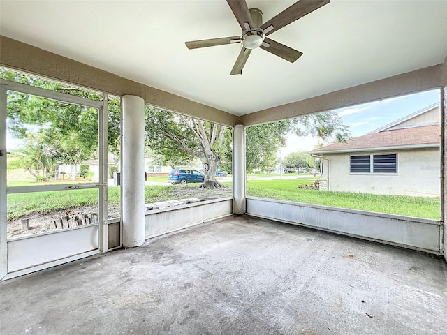 12214 Partridge Hill Row, Hudson, FL 34667 - unfurnished sunroom with a ceiling fan