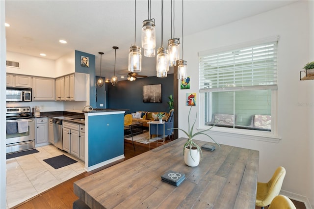 2010 E Palm Ave Unit 14312, Tampa, FL 33605 - dining room with a ceiling fan and recessed lighting