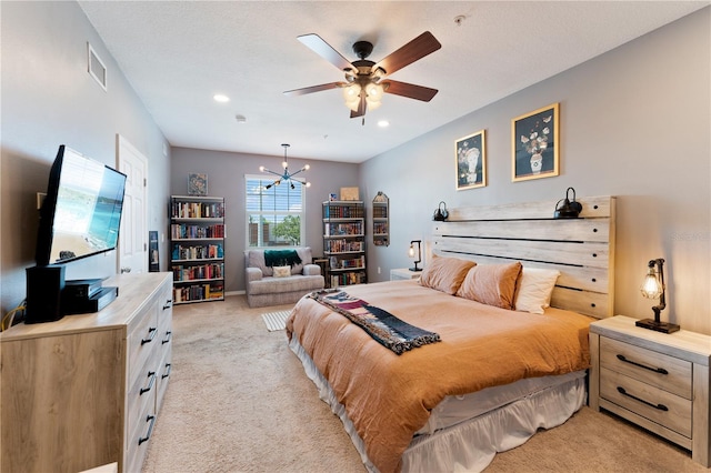 2010 E Palm Ave Unit 14312, Tampa, FL 33605 - bedroom with light colored carpet, a chandelier, recessed lighting, and ceiling fan