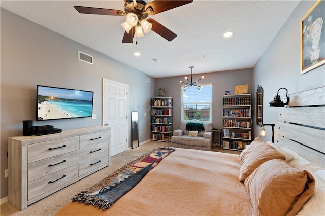 2010 E Palm Ave Unit 14312, Tampa, FL 33605 - bedroom with a chandelier, light colored carpet, a ceiling fan, and recessed lighting