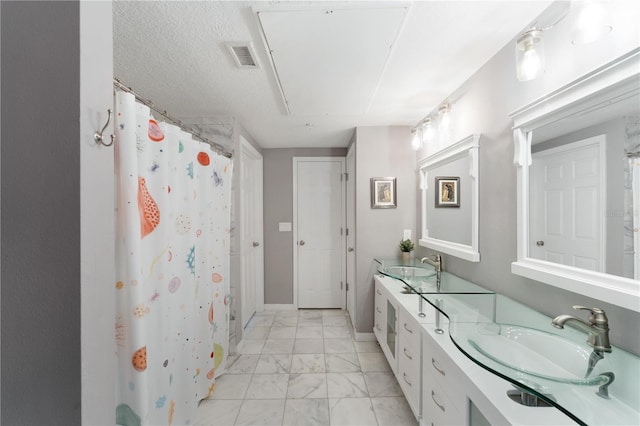 2010 E Palm Ave Unit 14312, Tampa, FL 33605 - bathroom featuring marble look tiles, double vanity, and a shower with curtain