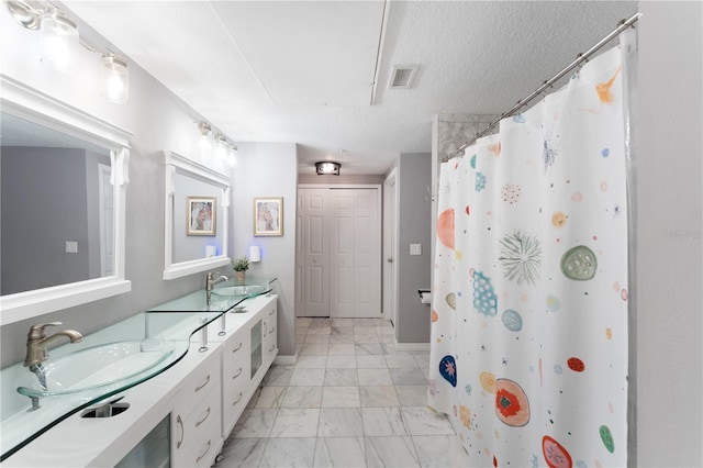 2010 E Palm Ave Unit 14312, Tampa, FL 33605 - full bath featuring marble finish floors, double vanity, and curtained shower
