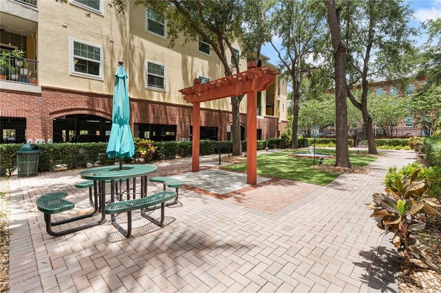 2010 E Palm Ave Unit 14312, Tampa, FL 33605 - view of community with a pergola