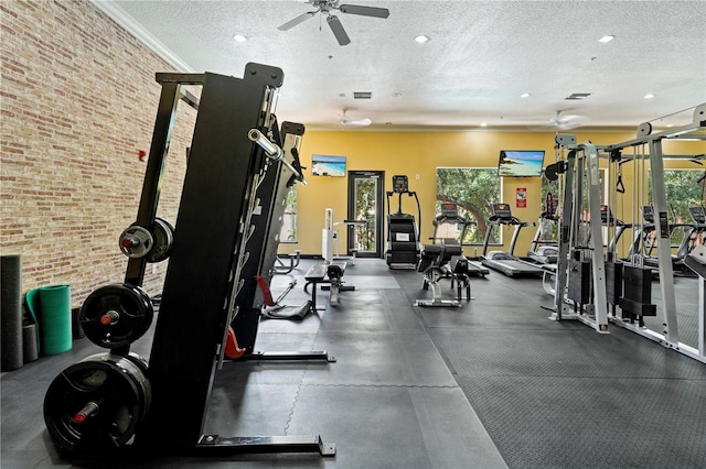 2010 E Palm Ave Unit 14312, Tampa, FL 33605 - exercise room featuring a textured ceiling, a ceiling fan, recessed lighting, and brick wall