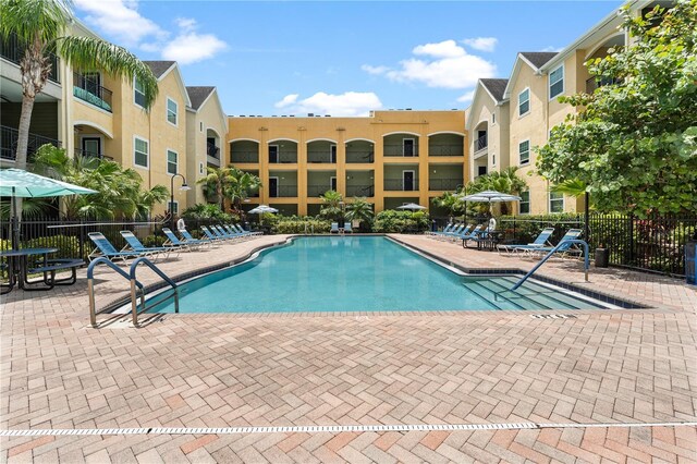 2010 E Palm Ave Unit 14312, Tampa, FL 33605 - community pool with a patio area