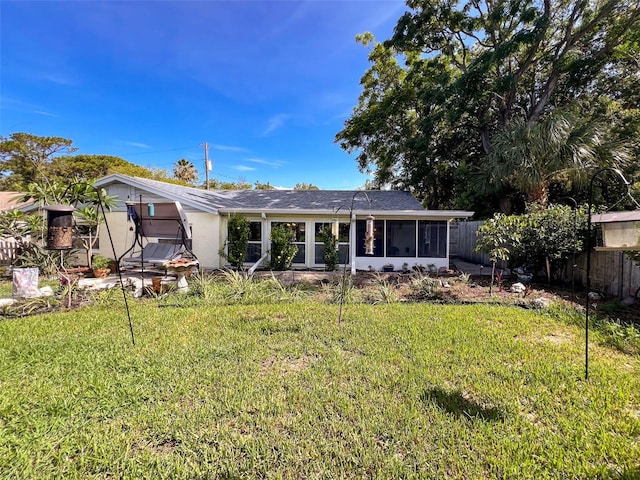 8640 Horizon Ln, Hudson, FL 34667 - rear view of house with a sunroom