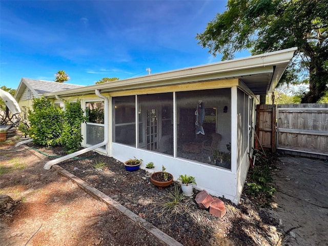 8640 Horizon Ln, Hudson, FL 34667 - back of property featuring a sunroom