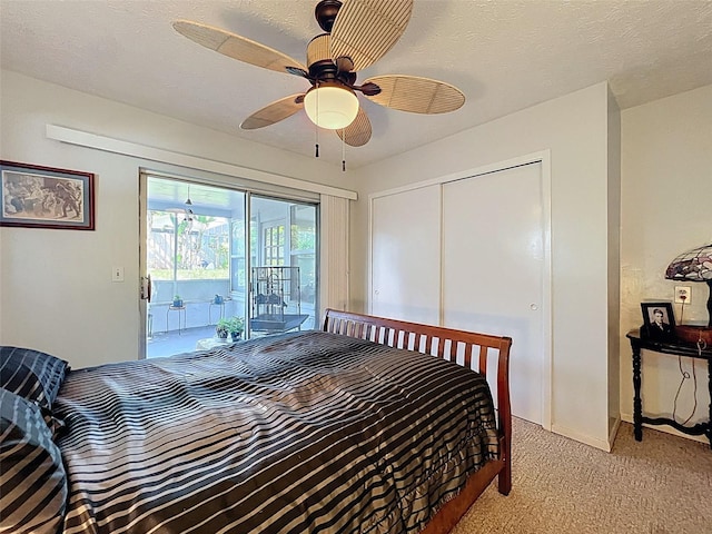 8640 Horizon Ln, Hudson, FL 34667 - bedroom featuring access to outside, light carpet, a closet, and a ceiling fan