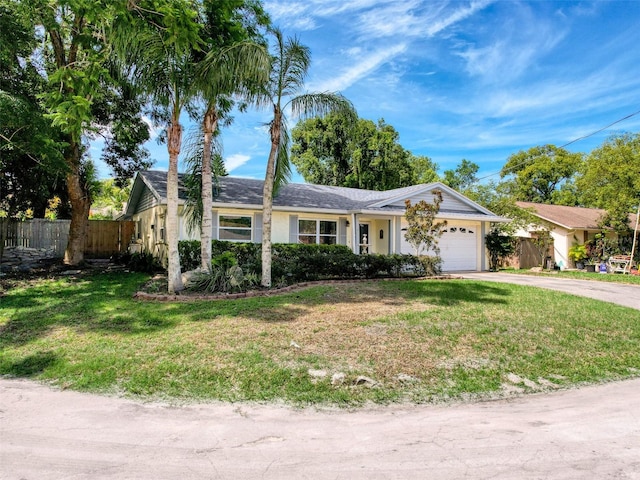 8640 Horizon Ln, Hudson, FL 34667 - ranch-style home featuring an attached garage and driveway