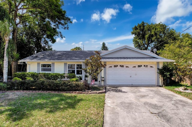 8640 Horizon Ln, Hudson, FL 34667 - ranch-style house featuring driveway, a front lawn, a garage, and stucco siding