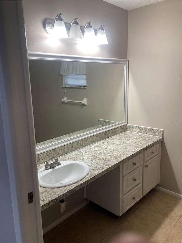 7806 Jenner Ave, New Port Richey, FL 34655 - bathroom with tile patterned flooring and vanity