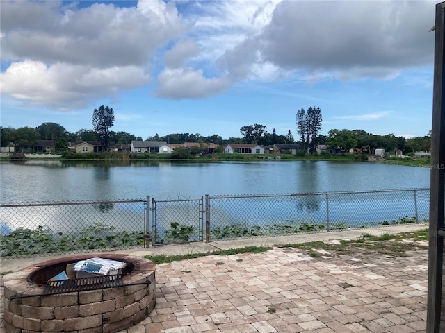 7806 Jenner Ave, New Port Richey, FL 34655 - water view featuring a fire pit and a gate