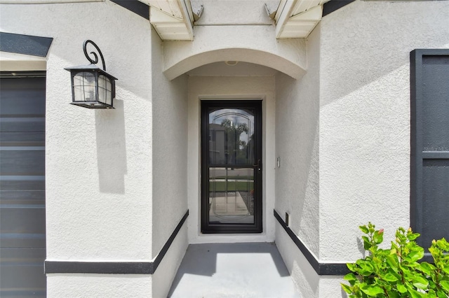 11861 Downy Birch Dr, Riverview, FL 33569 - view of exterior entry featuring stucco siding