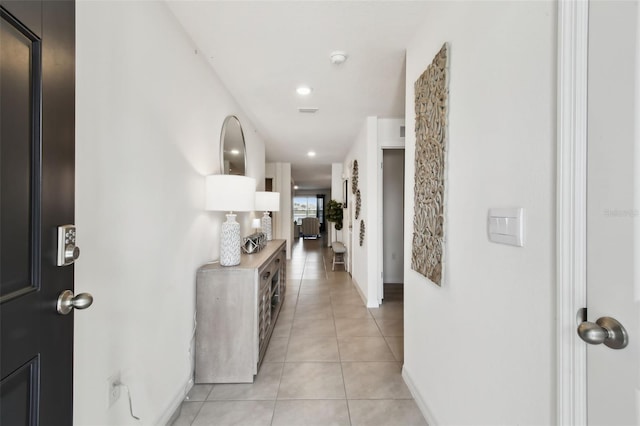 11861 Downy Birch Dr, Riverview, FL 33569 - hallway with light tile patterned floors and recessed lighting