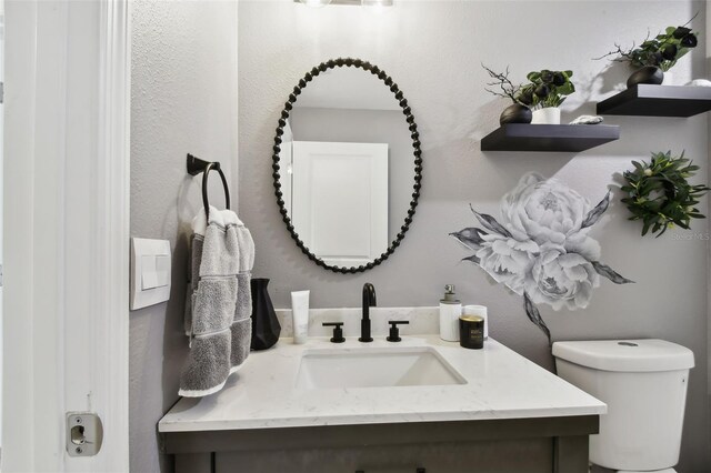 11861 Downy Birch Dr, Riverview, FL 33569 - half bathroom with vanity and a textured wall