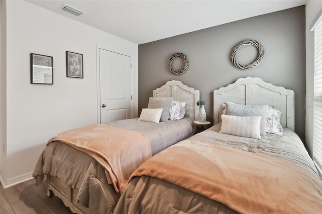 11861 Downy Birch Dr, Riverview, FL 33569 - bedroom featuring wood finished floors and baseboards