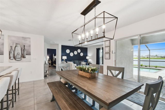 11861 Downy Birch Dr, Riverview, FL 33569 - dining room with light tile patterned floors and baseboards