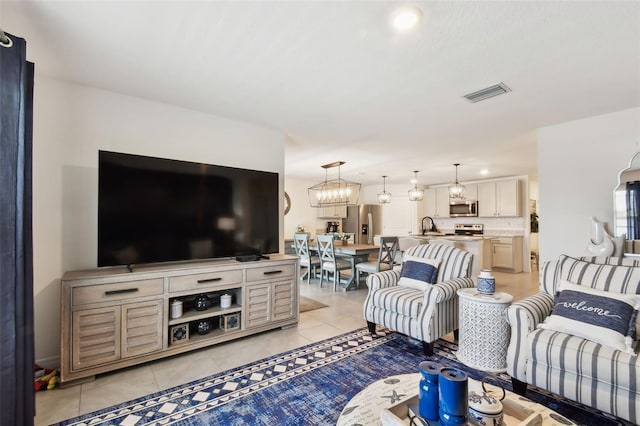 11861 Downy Birch Dr, Riverview, FL 33569 - living room featuring light tile patterned floors and recessed lighting