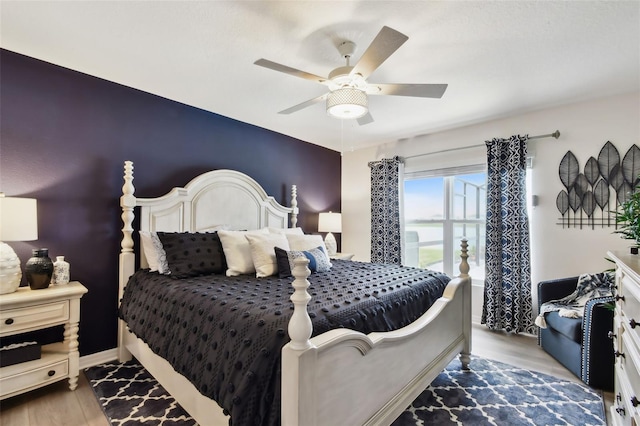 11861 Downy Birch Dr, Riverview, FL 33569 - bedroom featuring wood finished floors and a ceiling fan
