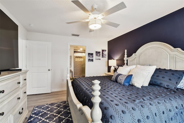 11861 Downy Birch Dr, Riverview, FL 33569 - bedroom with light wood-type flooring and ceiling fan