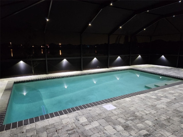 11861 Downy Birch Dr, Riverview, FL 33569 - outdoor pool with glass enclosure and a patio