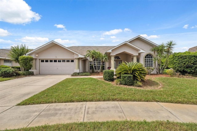8921 Kilmer Way, Hudson, FL 34667 - ranch-style home featuring stucco siding, an attached garage, a front lawn, and concrete driveway