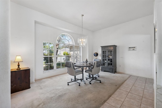 8921 Kilmer Way, Hudson, FL 34667 - carpeted dining room featuring a chandelier, a high ceiling, and tile patterned flooring