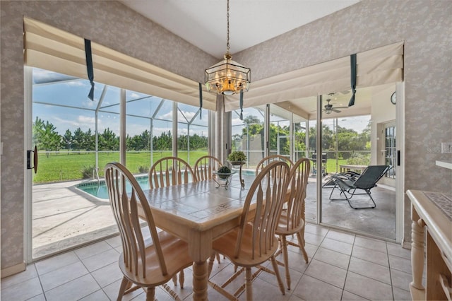 8921 Kilmer Way, Hudson, FL 34667 - sunroom featuring a ceiling fan and a chandelier