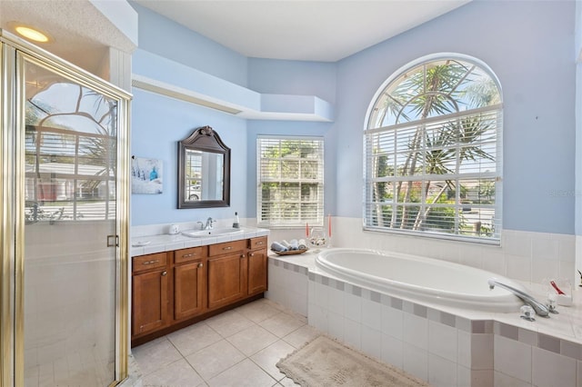8921 Kilmer Way, Hudson, FL 34667 - full bath featuring vanity, a bath, tile patterned floors, and a shower stall