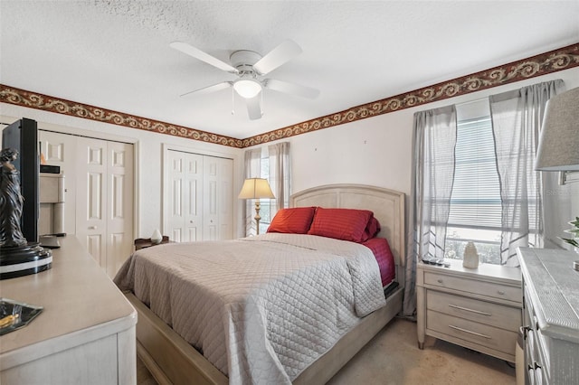8921 Kilmer Way, Hudson, FL 34667 - bedroom with multiple closets and ceiling fan