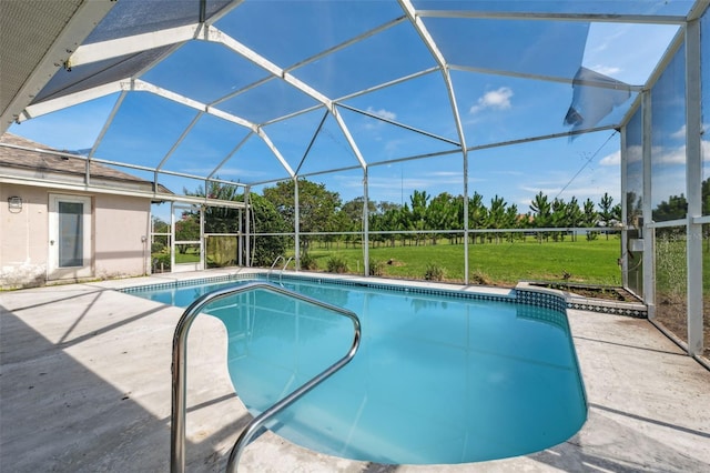 8921 Kilmer Way, Hudson, FL 34667 - outdoor pool with a patio area, glass enclosure, and a yard