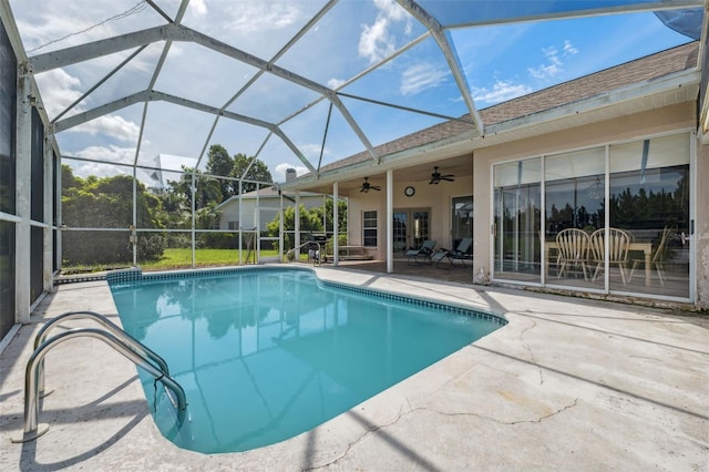 8921 Kilmer Way, Hudson, FL 34667 - swimming pool with a patio, ceiling fan, and glass enclosure