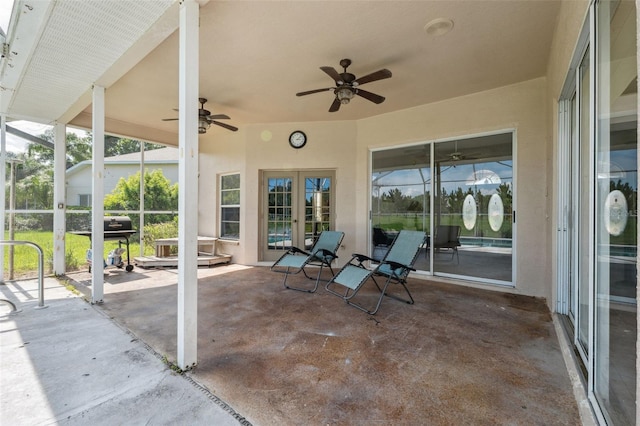 8921 Kilmer Way, Hudson, FL 34667 - view of patio / terrace featuring ceiling fan, area for grilling, and french doors