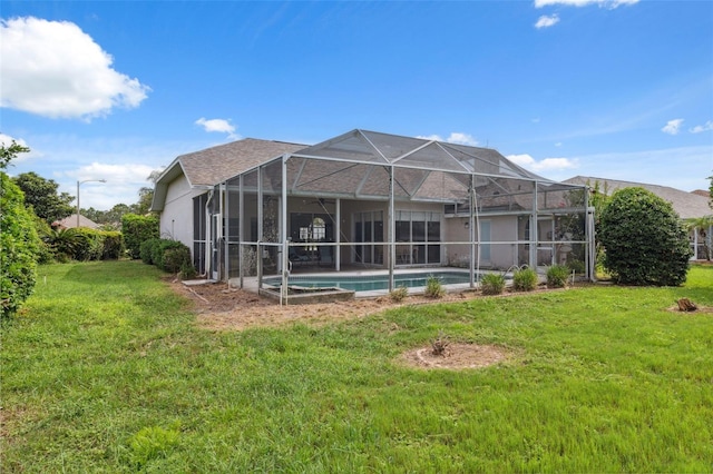 8921 Kilmer Way, Hudson, FL 34667 - rear view of house featuring a yard, an outdoor pool, and glass enclosure